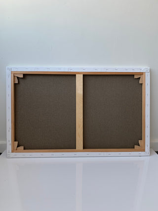 audekls uz koka rāmja